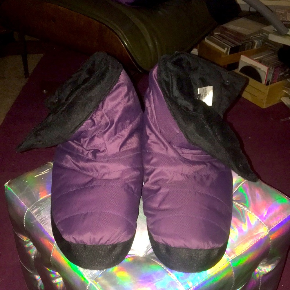 REI woman’s down booties, slaps on side